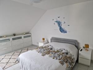 Villas Maison calme avec jardin, vue champs et bois : photos des chambres