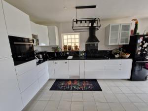 Villas Maison calme avec jardin, vue champs et bois : photos des chambres