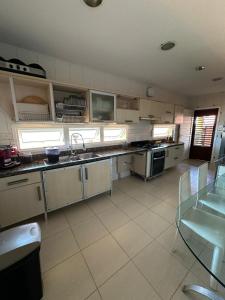 Casa Brysa de cotovelo