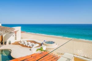 NEW LISTING! 4 Bd Beachfront Villa Fully Staffed