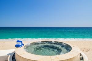 NEW LISTING! 4 Bd Beachfront Villa Fully Staffed