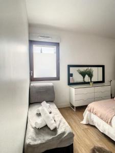 Appartements Grand Appart Renove Paris et Disneyland 4pers : photos des chambres