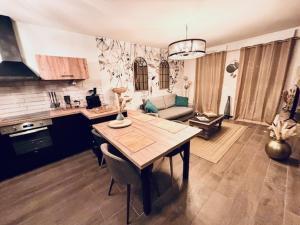 Appartements Le Plessis Capitale - Appartement entier avec jardin : photos des chambres