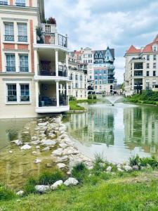 Appartements Le Plessis Capitale - Appartement entier avec jardin : photos des chambres