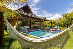 Bangalô no Eco Resort Carneiros beira-mar