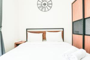 Fully Furnished and Comfortable Studio at Ciputra International Apartment By Travelio