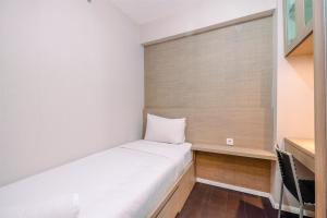 Nice and Fresh 2BR at Bassura City Apartment By Travelio