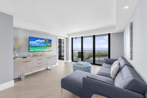 Elegant beachfront condo in private community