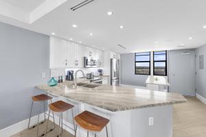 Elegant beachfront condo in private community