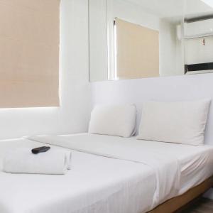 Homey and Simply 2BR at Lagoon Bekasi Town Square Apartment By Travelio