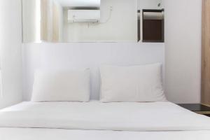 Homey and Simply 2BR at Lagoon Bekasi Town Square Apartment By Travelio