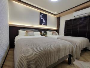 12全新装修 5室1厅2浴室2卫生间 设施齐全 最大12人 5 rooms 1dining room 2 bathrooms 2toilets Max 12P 免费无线网络