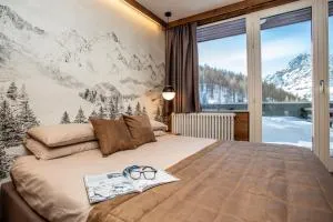 WHISPERING PINES LODGE Mountain view apartment with ski-in access - Zermatt