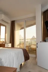 Eyes Of Egypt Pyramids View Boutique Hotel - Kafret Nassar