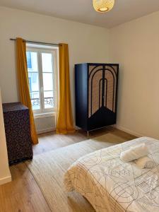 Appartements Les Arcades - WiFi - Spacieux - Centrale : photos des chambres