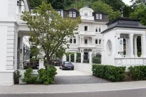 House of Hütter- Heidelberg Suites Guesthouse - Доссенгайм