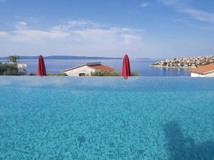 Sea view apartments with heated infinity swimming pool