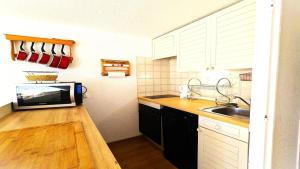 Appartements Residence Les Anemones - Grand appartement T3, ensoleille, avec balcon, pour 6 personnes MAE-6911 : photos des chambres
