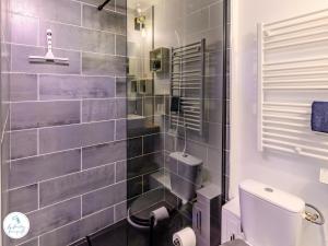 Appartements Nid Urbain - Proche Tribunal - Centre - wifi - TV : photos des chambres