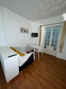 Appartements Studio N•2 avec patio en plein coeur de la ville : photos des chambres
