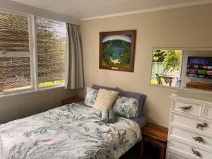 Lower level unit in the backyard, past the gate on the right of house - Ellerslie