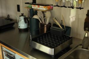 Enjoy old games and have indoor BBQ at Kairas House