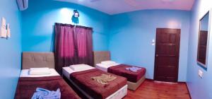 Sukau Backpackers Bed & Breakfast