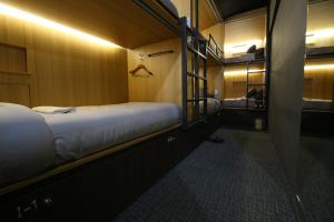 1 người trong phòng Tập Thể 6 giường (Nữ) (6-Bed Dormitory -- Female Only)