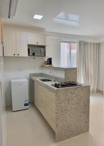 Flat à beira-mar, próximo às festas de verão