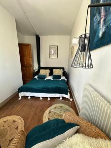 Maisons de vacances La maison bleue : photos des chambres