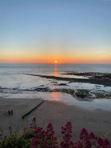 Maisons de vacances La maison bleue : photos des chambres