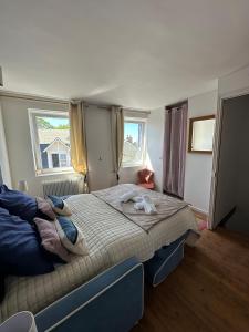 Maisons de vacances La maison bleue : photos des chambres