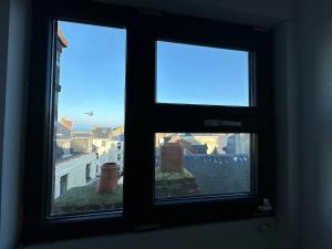 Maisons de vacances La maison bleue : photos des chambres