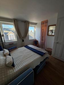 Maisons de vacances La maison bleue : photos des chambres