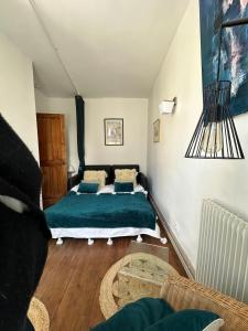 Maisons de vacances La maison bleue : photos des chambres