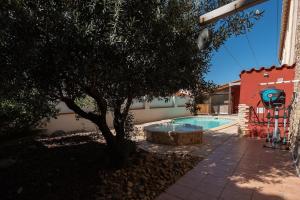 Maisons de vacances Maison Bompas 6 personnes piscine et jacuzzi : photos des chambres