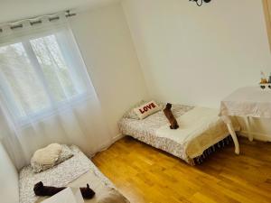 Appartements Le Confort Urbain : photos des chambres