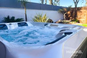 Maisons de vacances L-Olivier - Private Spa and Garden : photos des chambres