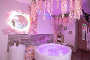 Cocon des Merveilles - balnéo ronde avec cascade