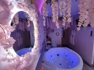 Cocon des Merveilles - balnéo ronde avec cascade