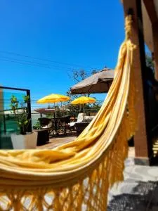 Pousada Anjos - à 2 quadras do mar - 马蒂尼奥斯