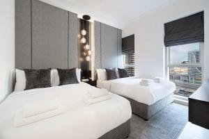 3BR Luxury Escape at Mon Reve I Access to Pool and Gym