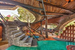 SaffronStays Terracotta Trails - 2BR eco-luxury villa with earthy design, pool, open lawns & sustainable living in Wada