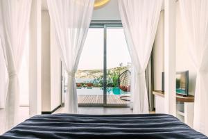 Junior Suite Partial Sea View with Pool room in Cape Bodrum Beach Resort
