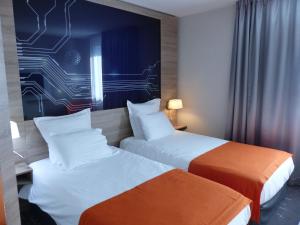 Hotels Mercure Poitiers Site du Futuroscope : photos des chambres