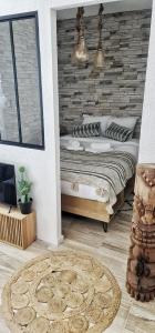 Appartements N1-Terrasse - Barbacane - Pieds Cite - Clime Mobile : photos des chambres