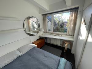 Piccola camera in appartamento condiviso con terrazza vista mare