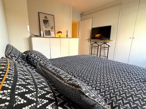 Appartements L-appartement Dantan : photos des chambres