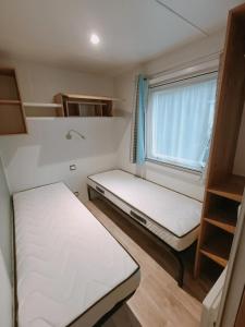 Maisons de vacances Bungalow confortable a Saint-Brevin-les-Pins avec piscine, 40 m² : photos des chambres