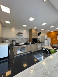 Casa de praia em condomínio com piscina